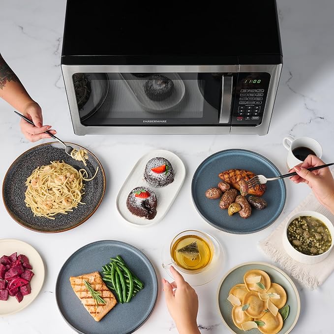 Farberware Countertop Microwave Oven 1.2 Cu. Ft. 1000 Watt with LED Lighting, Child Lock, Easy Clean Grey Interior, Stainless Steel, Black Stainless