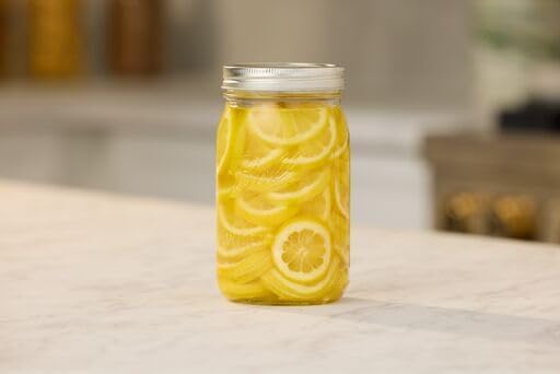 Ball Regular Mouth Glass Mason Jars with Lids and Bands, Used for Canning (Quart, 32 Ounce (Pack of 4))