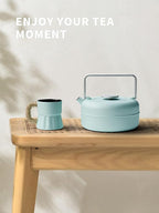 Toptier Teapot with Removable Infuser, Cast Iron Tea Kettle Stovetop Safe, Solid Geometry Cylinder Design Tea Pot Coated with Enameled Interior for 27 Ounce (800 ml), Babyblue