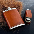 GENNISSY 8oz Hip Flask for Men - 304(18/8) Stainless Steel Bourbon Whiskey Flask, Leakproof with Brown Leather Wrap - Includes Funnel & 3 Mini Cups for Dad, Gifts, Travel