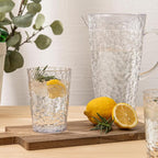 Bzyoo 74oz Clear ChillCraft Water Jug, BPA-Free Pitcher with Lid, Hammered Glass-Style Durable Plastic, Ripple Effect Design, Easy-Pour Spout, Ideal for Orange Juice, Iced Tea, Infused Waters