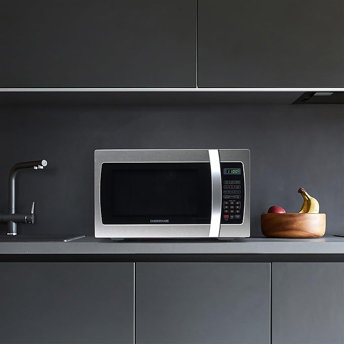 Farberware Countertop Microwave 1000 Watts, 1.3 Cu. Ft. - Microwave Oven With LED Lighting and Child Lock - Perfect for Apartments and Dorms - Easy Clean Stainless Steel