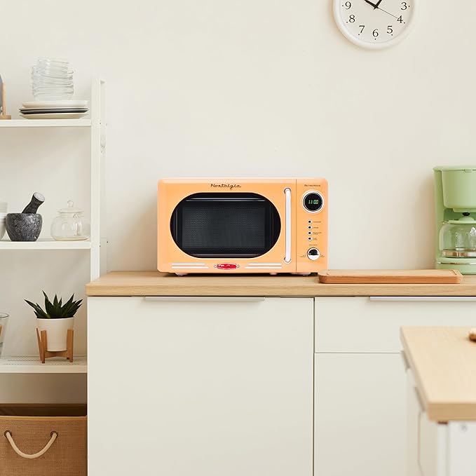 Nostalgia Retro Compact Countertop Microwave Oven 0.7 Cu. Ft. -700-Watts with LED Digital Display-Child Lock-Easy Clean Interior-Orange