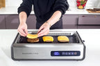 Indoor Smokeless Grill 1500W with Smart LED Touch Screen, Tempered Glass Lid, 2 Removable Ceramic Nonstick Grill & Griddle Plate, in a Modern Stainless Steel Design.