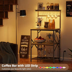 Furologee Bakers Rack with Power Outlet and LED Light, Small Coffee Bar Station with 4 Tier Shelves, Microwave Stand Table with 6 S Hooks, Kitchen Storage Rack for Spices, Pots, Black Oak