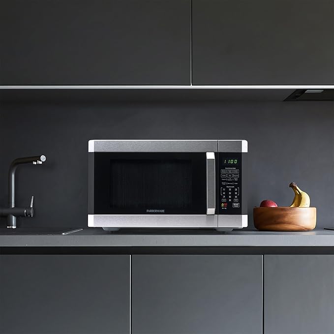 Farberware Countertop Microwave 1100 Watts, 1.6 cu ft - Smart Sensor Microwave Oven With LED Lighting and Child Lock - Perfect for Apartments and Dorms - Easy Clean - Stainless Steel