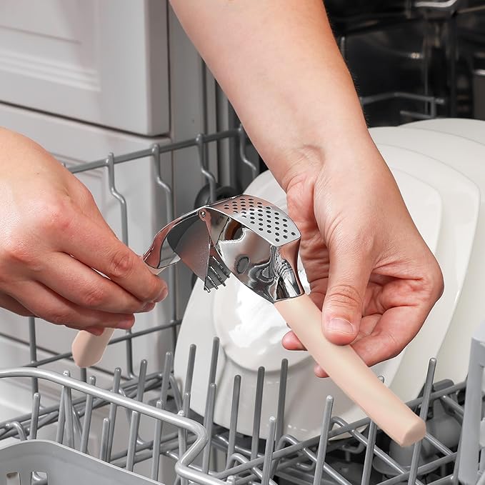 Zulay Kitchen Comfort Grip Garlic Press - Garlic Mincer Tool - Garlic Crusher - Garlic Press Mincer Rust Proof, with Soft Ergonomic Handle, Easy Clean Set with Peeler and Brush - Light Pink