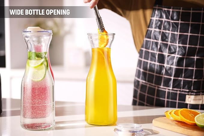 AYL Set of 4 Glass Carafes with Lids (1 Liter) – Clear Glass Water Pitchers and Beverage Serveware for Mimosa Bars, Brunch, Parties, Wine, Juice, Milk, Iced Tea, and Lemonade with Easy-Pour Spout Lids