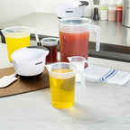 Restaurantware Measuring Cups, 1 Quart Pack of 10 Conical Spout Baking Measuring Cups, Liquid Scaling Vessels with I-Beam Handle, Embossed Graduations, Clear, Break and Crack Resistant for Baking