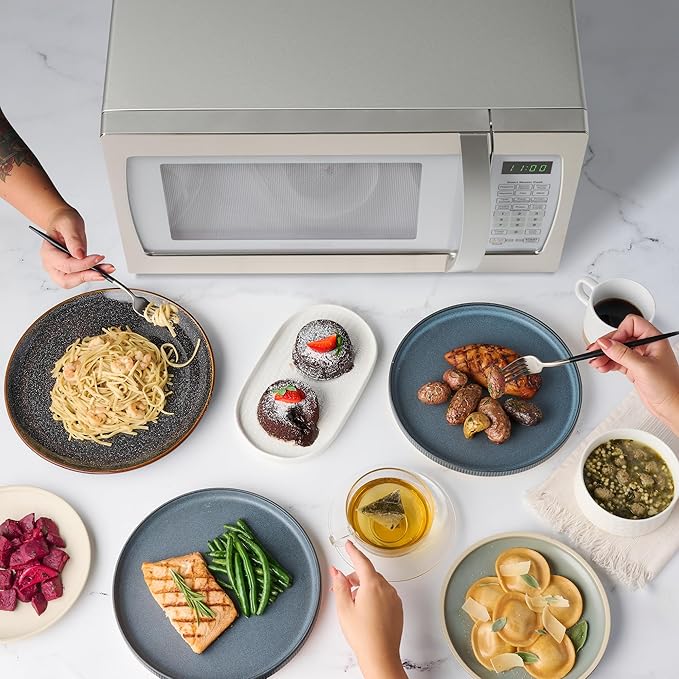 Farberware Countertop Microwave 1100 Watts, 1.3 cu ft - Smart Sensor Microwave Oven With LED Lighting and Child Lock - Perfect for Apartments and Dorms - Easy Clean Retro White, Platinum