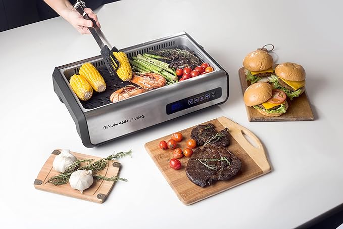 Indoor Smokeless Grill 1500W with Smart LED Touch Screen, Tempered Glass Lid, 2 Removable Ceramic Nonstick Grill & Griddle Plate, in a Modern Stainless Steel Design.
