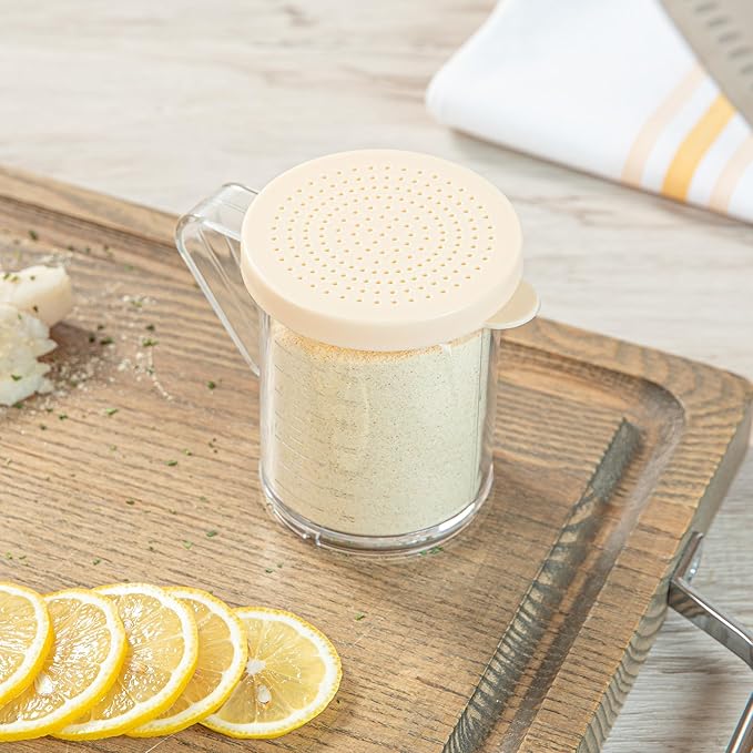 Restaurantware RW Base 10 Ounce Clear Plastic Dredge Spice Shaker 1 Reusable Dry Rub Shaker - Includes Beige Perforated Lid With Handle Clear Polycarbonate Spice Shaker For Fine Seasonings