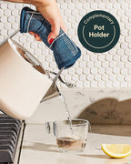 Caraway 2 Quart Whistling Tea Kettle - Durable Stainless Steel Tea Pot - Fast Boiling, Stovetop Agnostic - Non-Toxic, PTFE & PFOA Free - Includes Pot Holder - Black