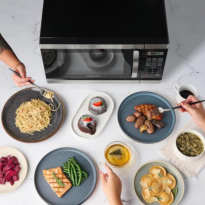Farberware Countertop Microwave 1000 Watts, 1.1 Cu. Ft. - Microwave Oven With LED Lighting and Child Lock - Perfect for Apartments and Dorms - Easy Clean Stainless Steel