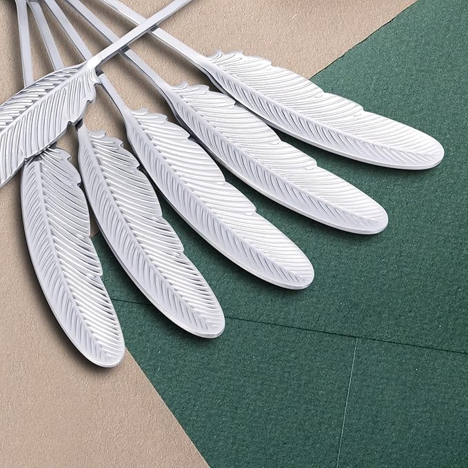 Creative spoons in multiple colors. They can be used to stir flower tea, coffee, and desserts. They're also great for decoration, collection, or as gifts. (silver with fine lines)