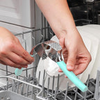 Zulay Kitchen Comfort Grip Garlic Press - Garlic Mincer Tool - Garlic Crusher - Garlic Press Mincer Rust Proof, with Soft Ergonomic Handle, Easy Clean Set with Peeler and Brush - Light Blue