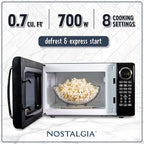 Nostalgia Retro Microwave Oven 0.7 Cu Ft, 700-Watt Countertop Size with Glass Turntable, Child Safety Lock, 8 Auto-Cook Programs, Digital Clock, Black