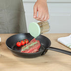 Restaurantware RW Base 10 Ounce Clear Plastic Dredge Spice Shaker 1 Reusable Dry Rub Shaker - Includes Green Perforated Lid With Handle Clear Polycarbonate Spice Shaker For Fine Seasonings