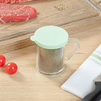 Restaurantware RW Base 10 Ounce Clear Plastic Dredge Spice Shaker 1 Reusable Dry Rub Shaker - Includes Green Perforated Lid With Handle Clear Polycarbonate Spice Shaker For Fine Seasonings